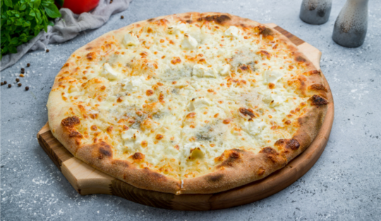 Pizza Quattro Formaggi. Rețeta care îți arată cum să combini brânzeturile